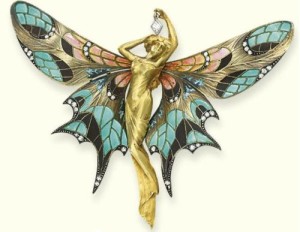 A gold and enamel brooch by Gaston Lafitte (1904).