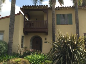 The tile around the doorway of this Mediterranean style home is a wonderful touch
