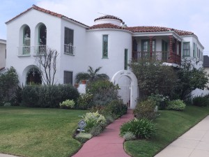 This duplex is a beautiful example of Spanish Colonial Revival