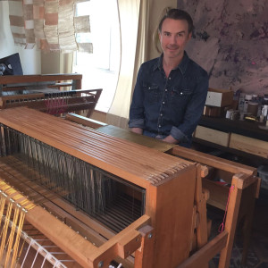 Andrew Paulson at one of his weaving looms. (Photo by G. Bruce Smith)
